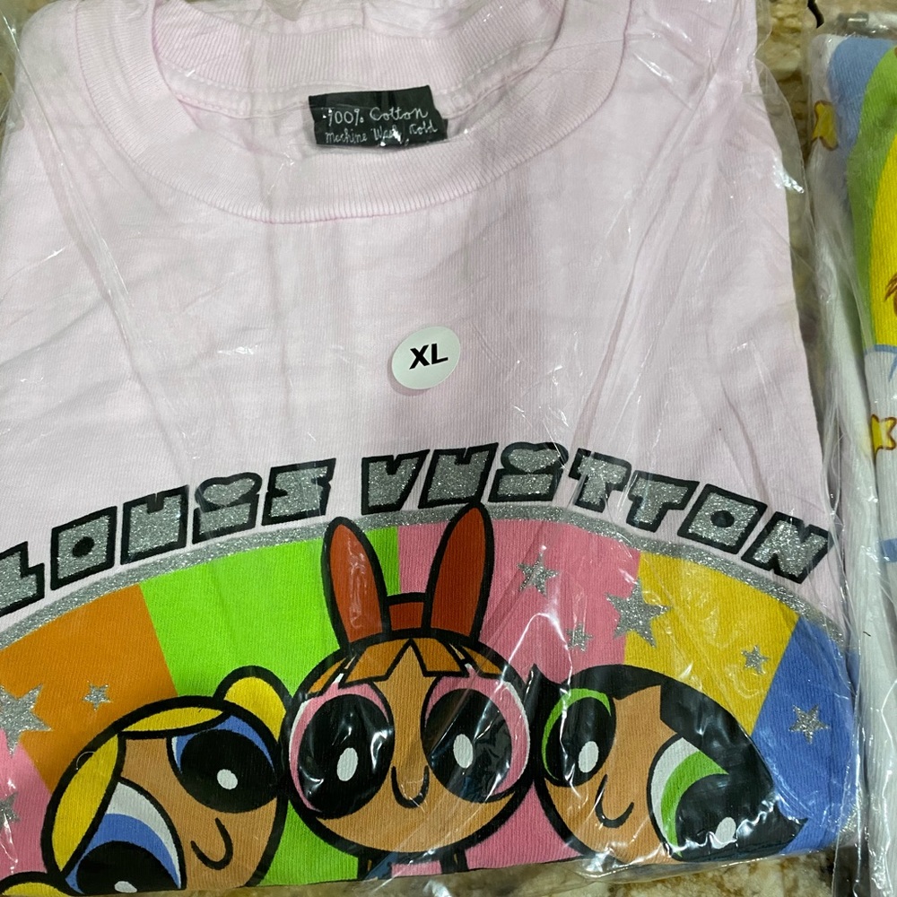 SOLD Mega yacht powderpuff girls shirt